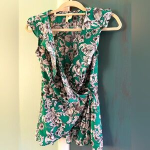 Sleeveless, wrap blouse